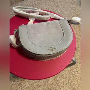 Kate Spade gray suede and leather crossbody saddle bag